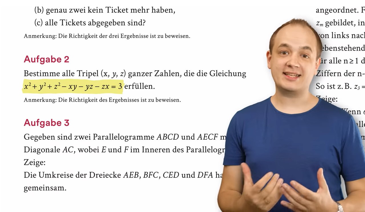 YouTuber DorFuchs steht vor dem Hintergrund Aufgabentext BWM 2023 Runde 1 